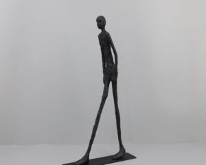 Tall Walking Man Figurine